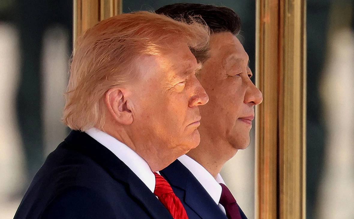 Трамп и Си Цзиньпин пожимают руки на переговорах