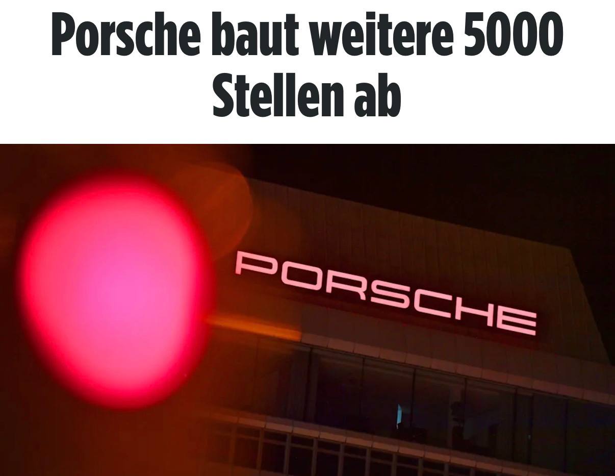 Логотип Porsche на фоне завода