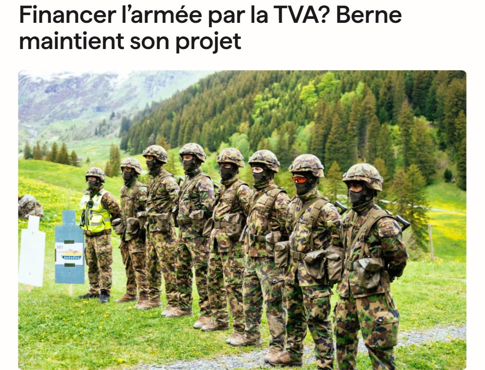 Швейцарский флаг на фоне Альп и военной техники