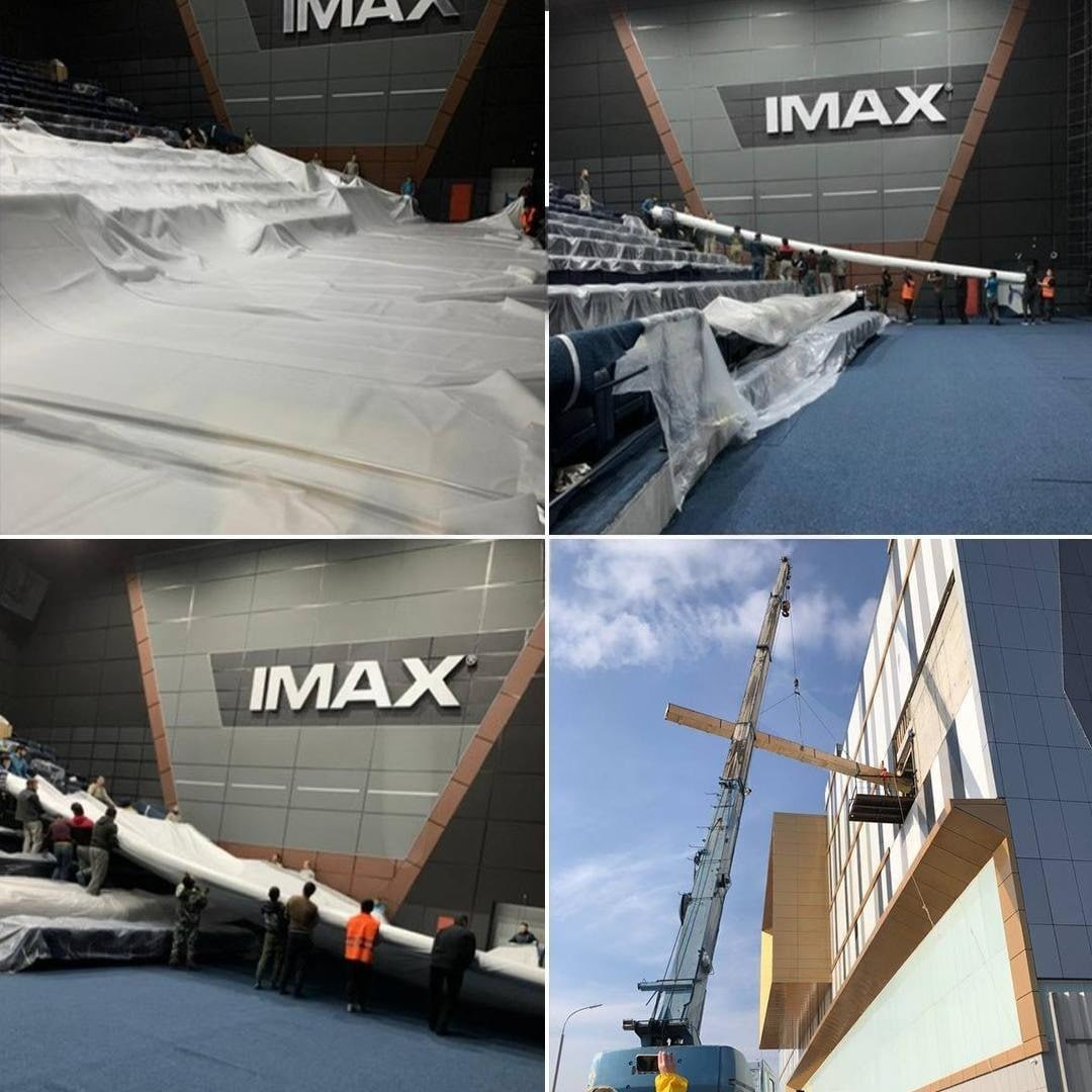 Поврежденный экран IMAX с пятном от трубочки
